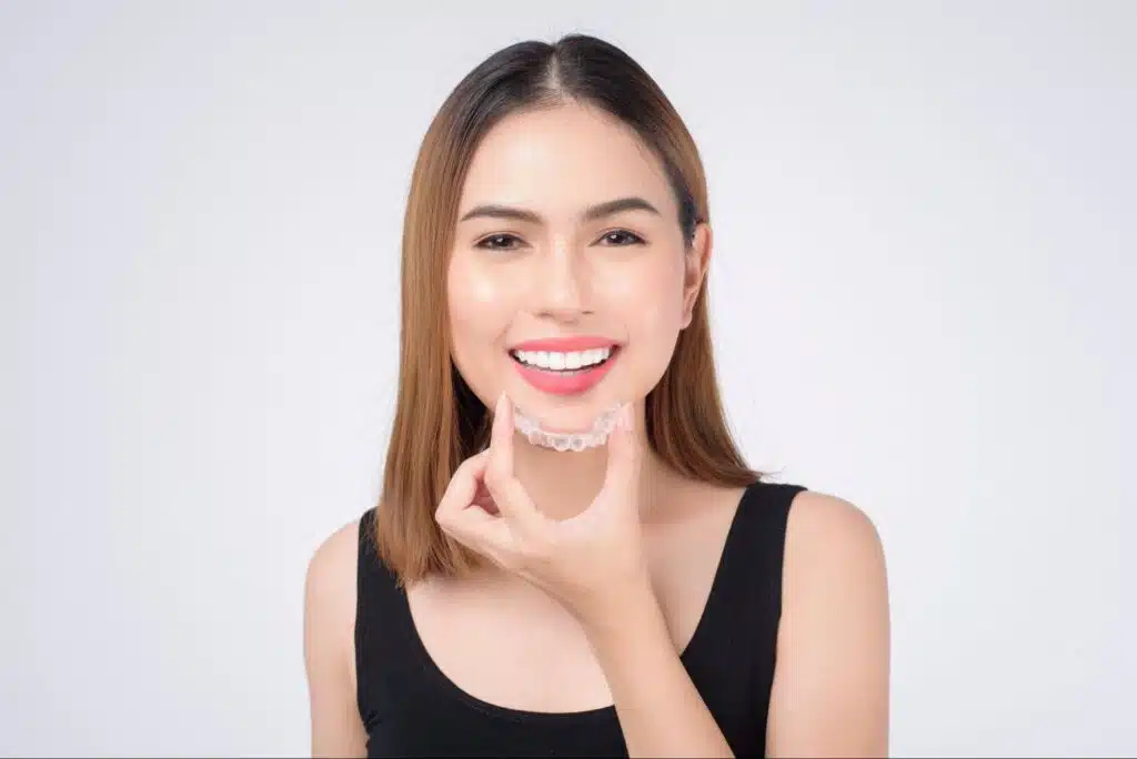 Patient wearing Invisalign aligners during treatment in Renton WA